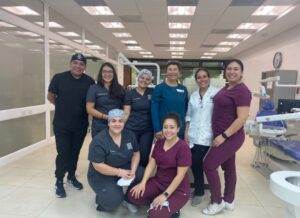 The United Tooth Fairies volunteer dental team standing together in the treatment clinic in Guatemala
